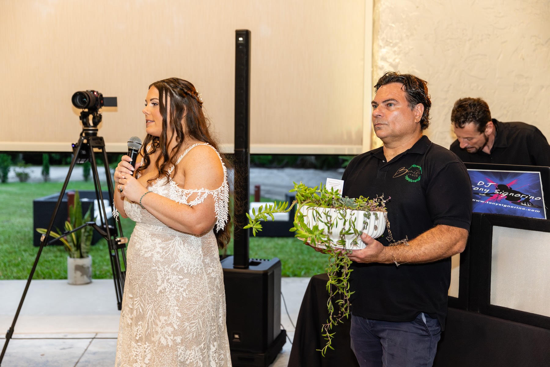 Bride presenting a succulent garden gift from Bonita Ranch plant nursery to her mother during a wedding in Melbourne Florida