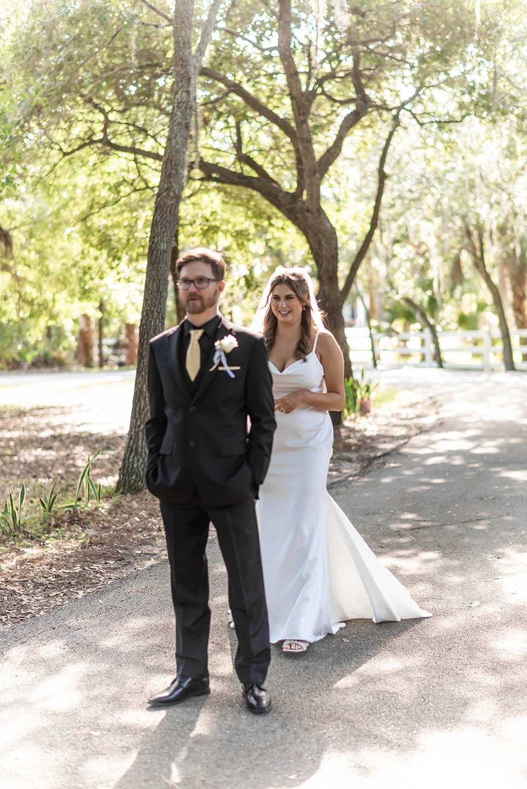 Bride smiling during first look moment with groom at Bonita Ranch wedding venue in Melbourne Florida