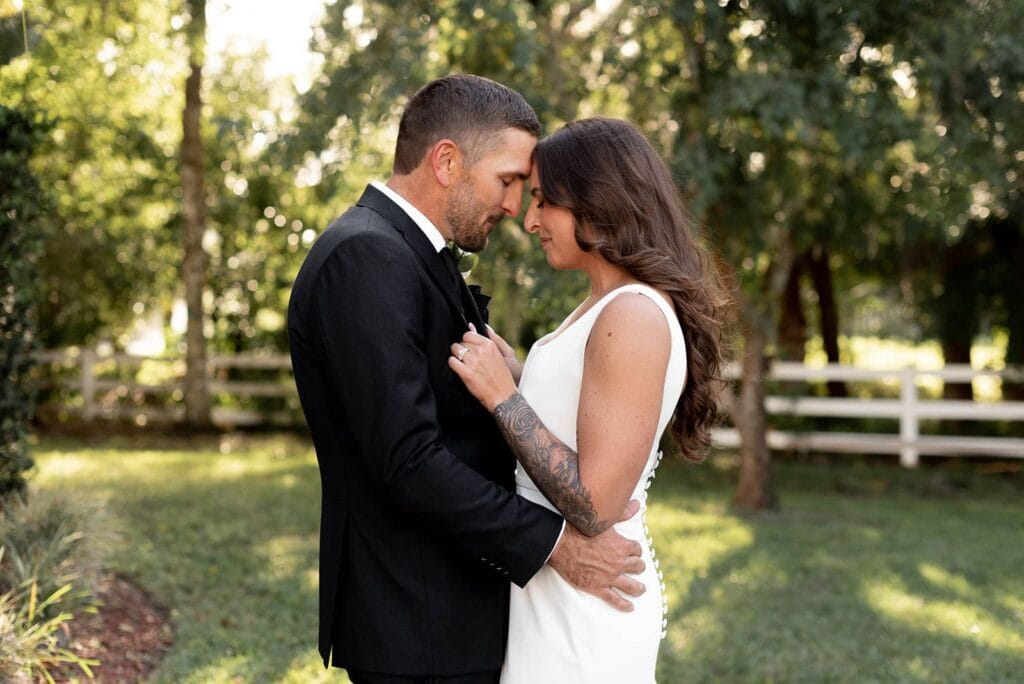 Intimate garden wedding couple at Bonita Ranch in Melbourne Florida surrounded by natural greenery