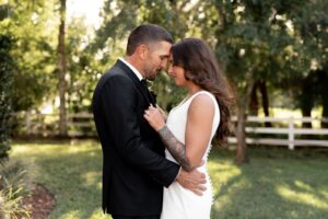 Intimate garden wedding couple at Bonita Ranch in Melbourne Florida surrounded by natural greenery