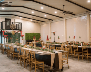 Corporate holiday party at Bonita Ranch in Melbourne, Florida, with festive tables and holiday décor