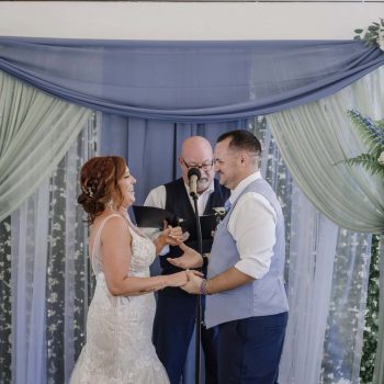 Elegant Star Wars-themed wedding ceremony at Bonita Ranch in Melbourne, Florida, with floral arrangements inspired by lightsabers and a romantic Mediterranean backdrop.