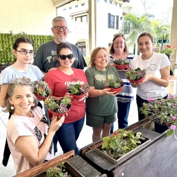 Group holding succulent gardens created during a plant workshop at Bonita Ranch in Melbourne Florida